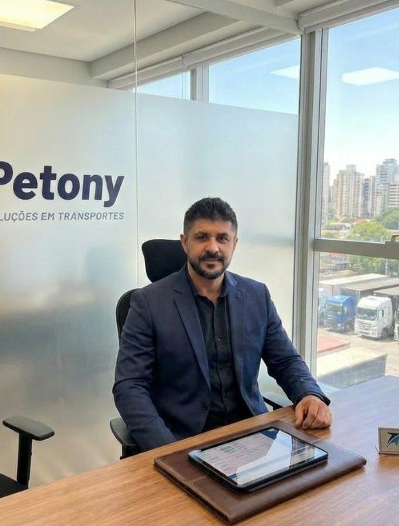 Pedro Amaral, co-founder of Petony Transportes, at his desk in the company's São Paulo office